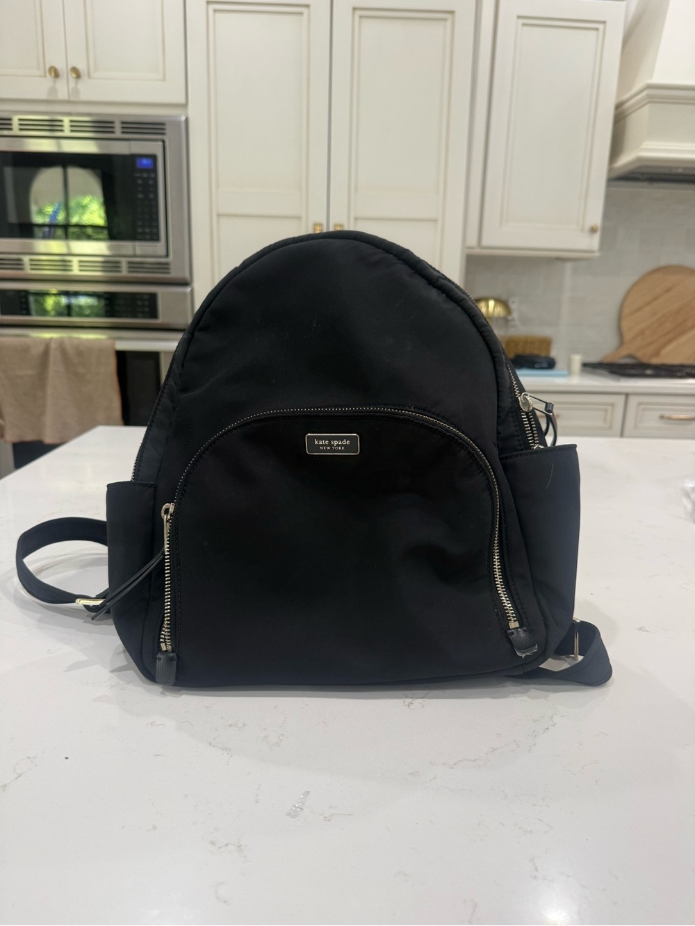 kate spade black nylon tote with gold plaque